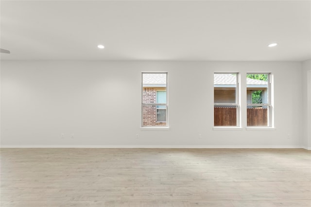 1810 Iris Rd, Melissa, TX 75454 - empty room featuring light wood-style flooring, recessed lighting, and baseboards