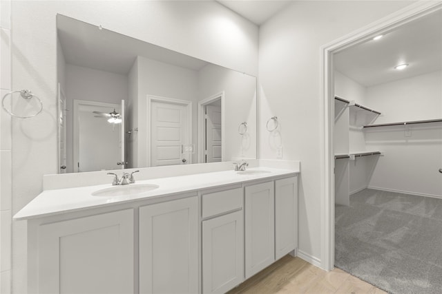 1810 Iris Rd, Melissa, TX 75454 - bathroom with double vanity and a walk in closet