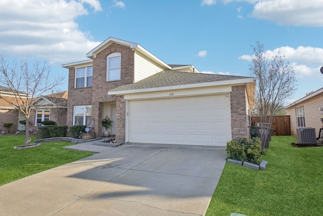 traditional-style house with concrete driveway, fence, a garage, cooling unit, and a front lawn