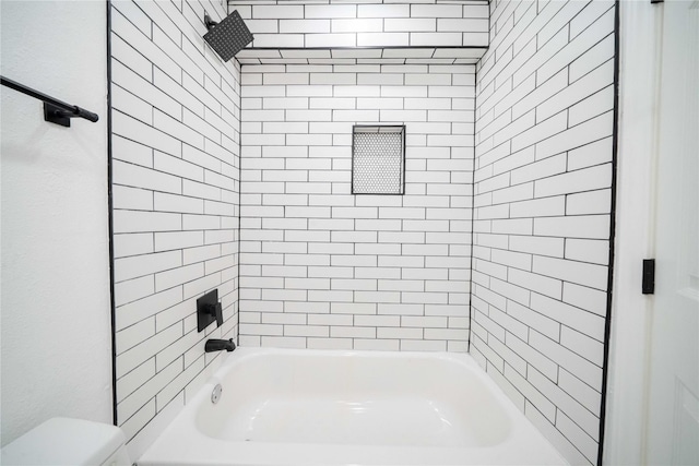 full bathroom with toilet and bathtub / shower combination