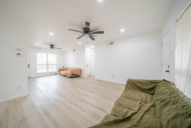 sitting room featuring ceiling fan, recessed lighting, visible vents, baseboards, and light wood finished floors