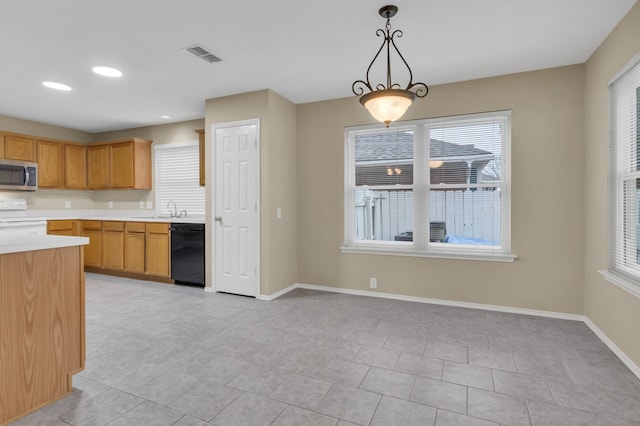 kitchen featuring stainless steel microwave, dishwasher, plenty of natural light, and white range with electric stovetop