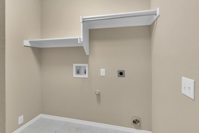 laundry area featuring hookup for an electric dryer, baseboards, hookup for a washing machine, hookup for a gas dryer, and laundry area