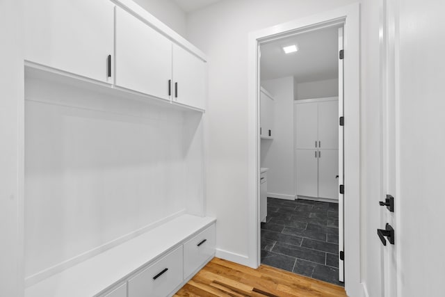 mudroom with light wood finished floors