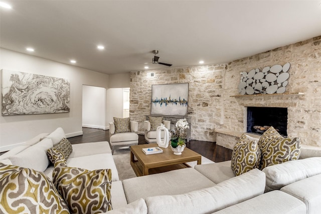 living room featuring recessed lighting, a large fireplace, ceiling fan, and wood finished floors