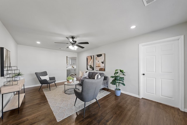 living room featuring recessed lighting, visible vents, dark wood finished floors, and baseboards