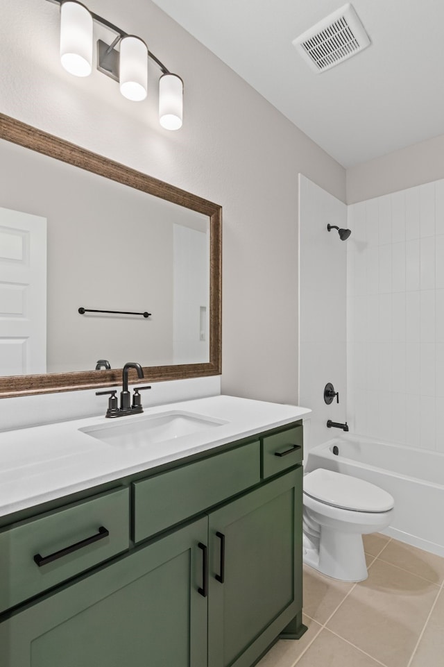 bathroom featuring bathtub / shower combination, toilet, vanity, visible vents, and tile patterned floors