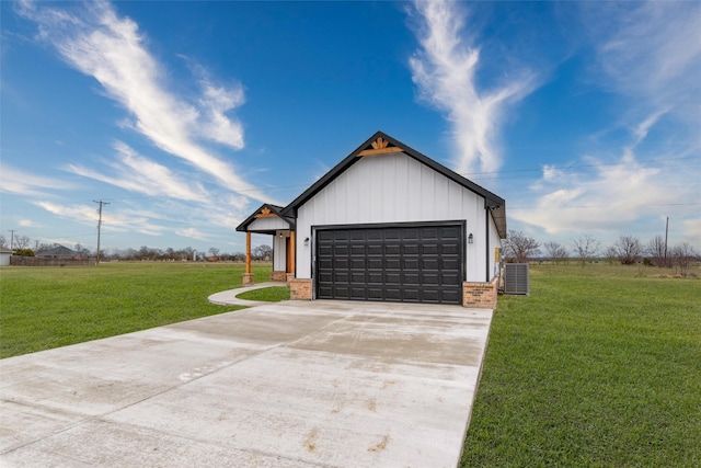 exterior space with concrete driveway and central AC