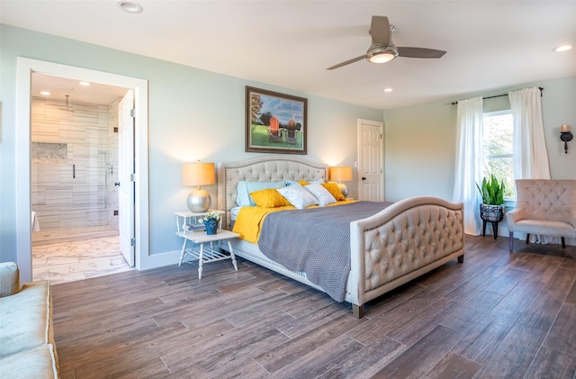 bedroom featuring baseboards, ensuite bathroom, wood finished floors, and recessed lighting