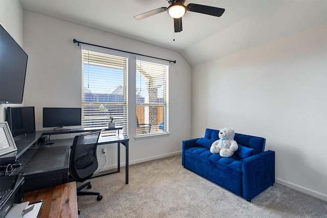 office space with a ceiling fan, carpet, lofted ceiling, and baseboards