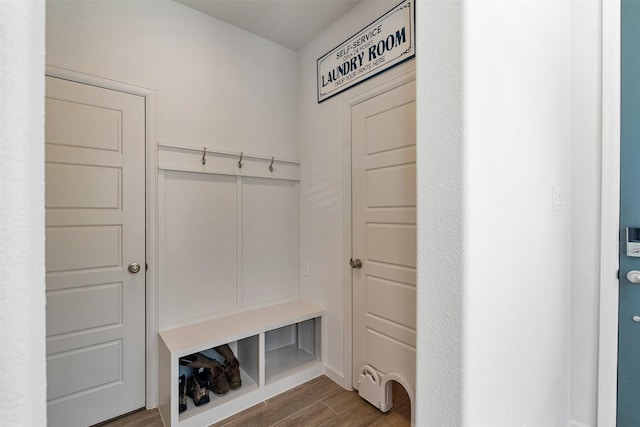 mudroom with wood finished floors