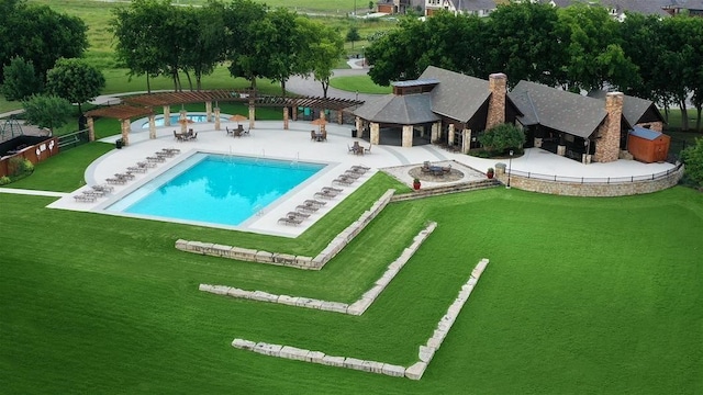 community pool featuring a lawn, a gazebo, a patio area, fence, and a pergola