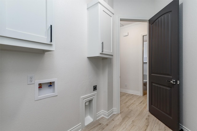 laundry room featuring cabinet space, baseboards, hookup for an electric dryer, light wood-type flooring, and washer hookup