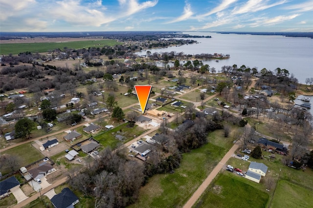 bird's eye view with a water view and a residential view