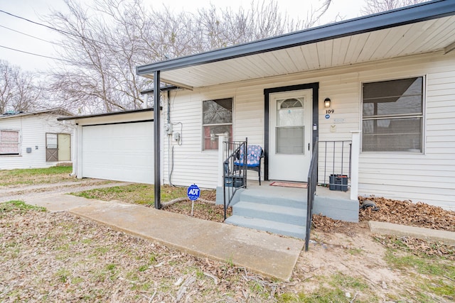 doorway to property with covered porch