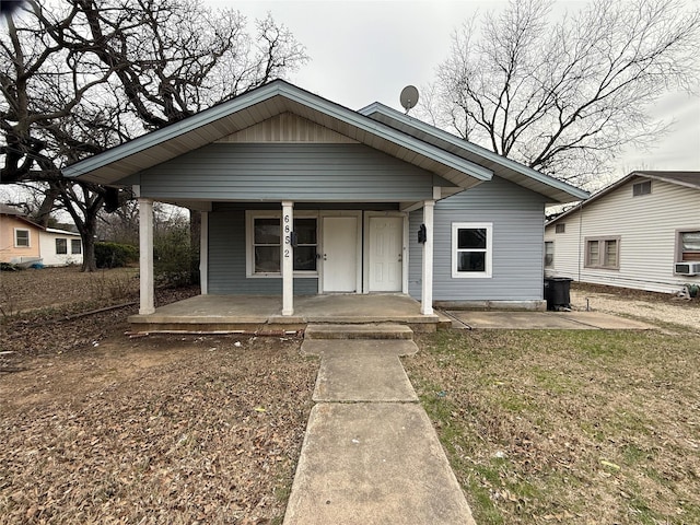 bungalow-style house featuring covered porch