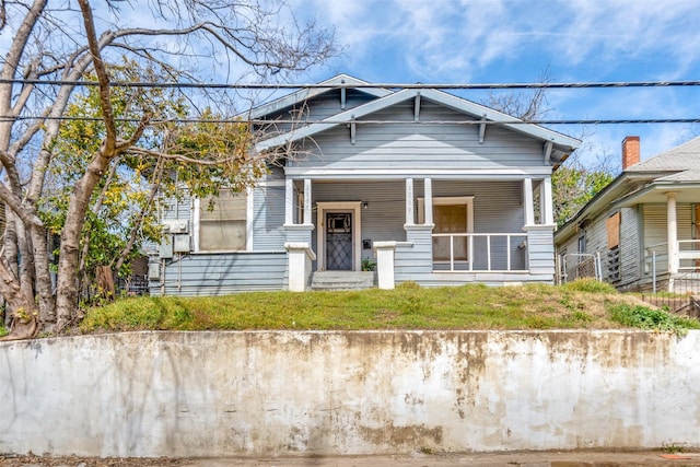 view of front of home featuring covered porch