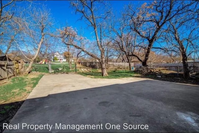 view of patio / terrace featuring fence