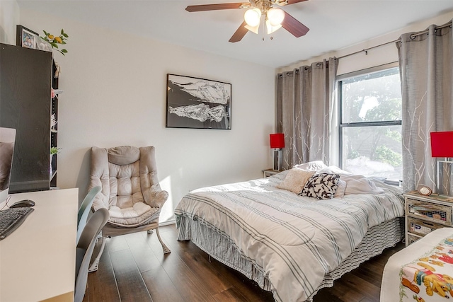 bedroom with wood finished floors and a ceiling fan