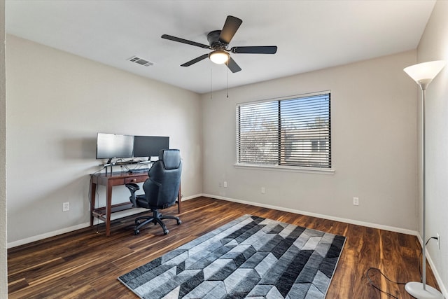 home office featuring dark wood-style floors and baseboards