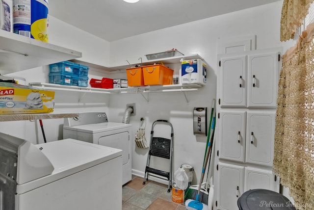 clothes washing area featuring washer and dryer