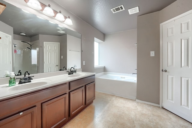 full bath with a bath, a sink, visible vents, and a shower stall