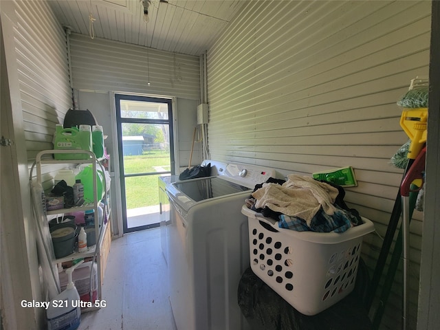clothes washing area with washer and dryer and laundry area