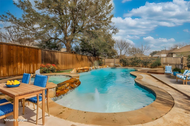 view of swimming pool with a fenced in pool, a patio, and a fenced backyard