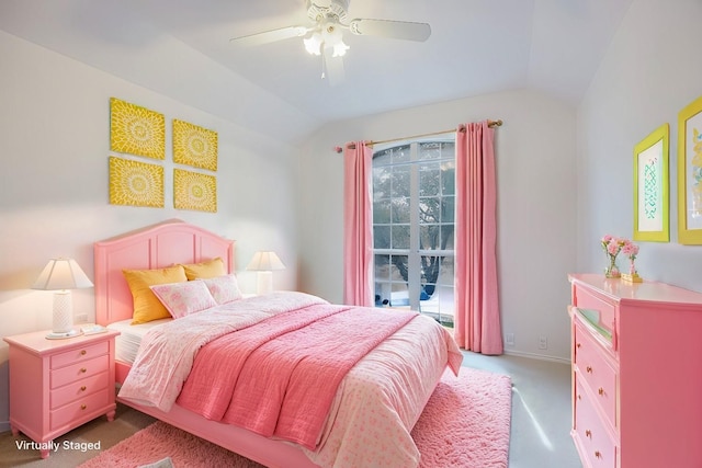 carpeted bedroom with ceiling fan and lofted ceiling