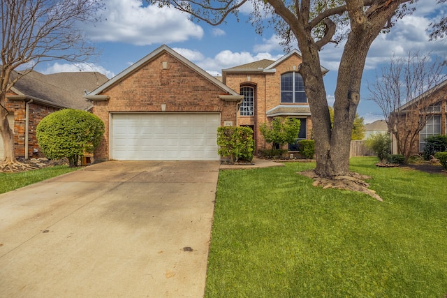 traditional-style home with a garage, brick siding, concrete driveway, and a front yard