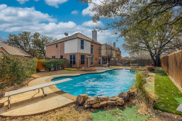 view of pool with a patio, a fenced backyard, and a fenced in pool