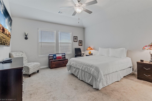 carpeted bedroom with ceiling fan, visible vents, and baseboards