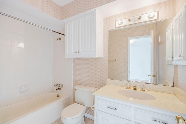 bathroom with shower / bath combination, toilet, and wallpapered walls