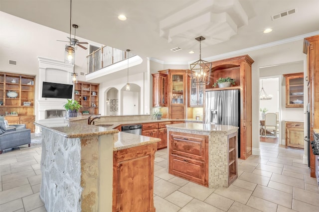 kitchen with arched walkways, brown cabinets, open shelves, stainless steel appliances, and visible vents