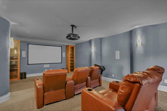 home theater with carpet and baseboards