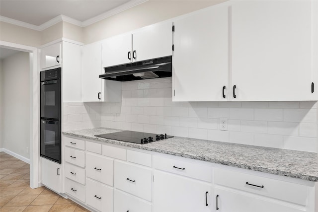 kitchen with decorative backsplash, ornamental molding, white cabinetry, under cabinet range hood, and black appliances