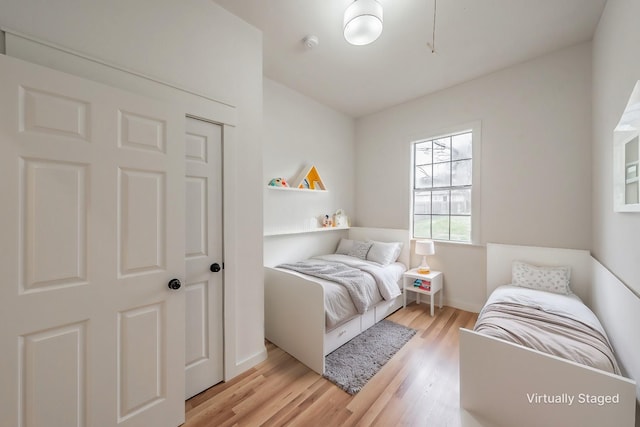 bedroom featuring light wood-style floors