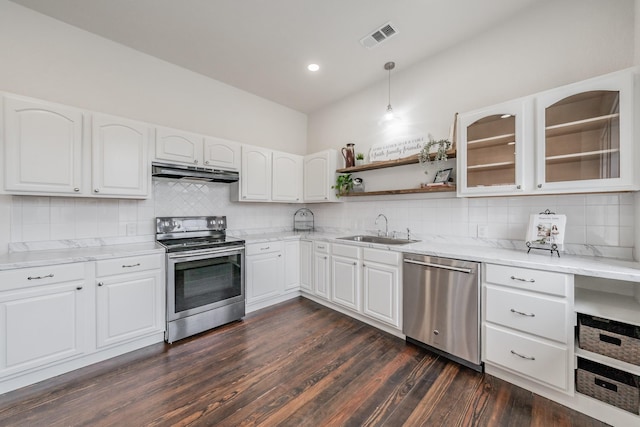 kitchen with appliances with stainless steel finishes, white cabinets, a sink, and under cabinet range hood