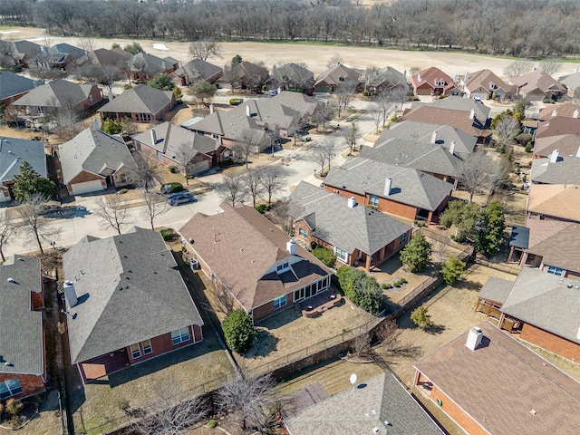 birds eye view of property with a residential view