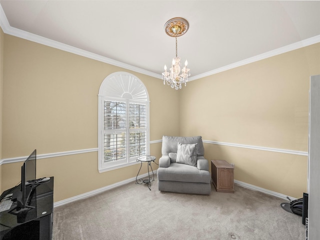 living area with a notable chandelier, carpet floors, crown molding, and baseboards