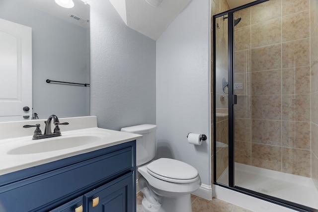 bathroom featuring a stall shower, visible vents, toilet, tile patterned floors, and vanity