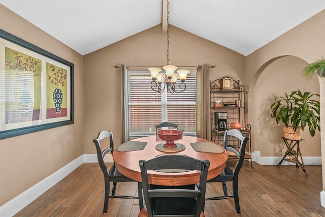 dining space featuring vaulted ceiling with beams, baseboards, wood finished floors, and a notable chandelier