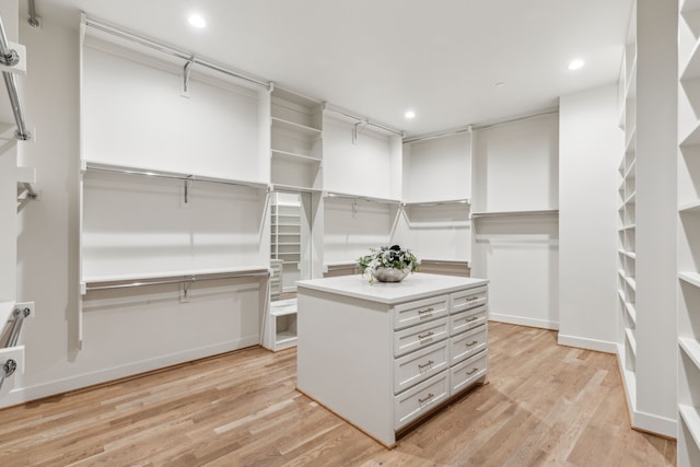 spacious closet with light wood-style flooring