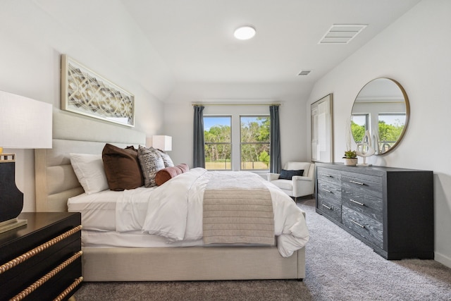 bedroom featuring visible vents and dark carpet