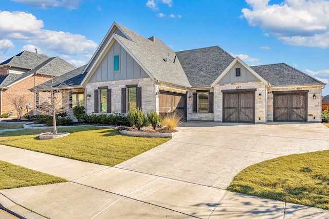 view of front facade with concrete driveway, roof with shingles, an attached garage, and board and batten siding