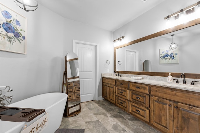 bathroom featuring a soaking tub, a sink, and double vanity