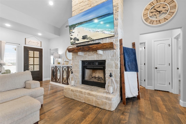 living room with recessed lighting, dark wood-type flooring, a stone fireplace, high vaulted ceiling, and baseboards