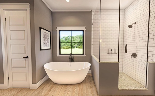 full bath with a stall shower, baseboards, ornamental molding, wood finished floors, and a freestanding bath