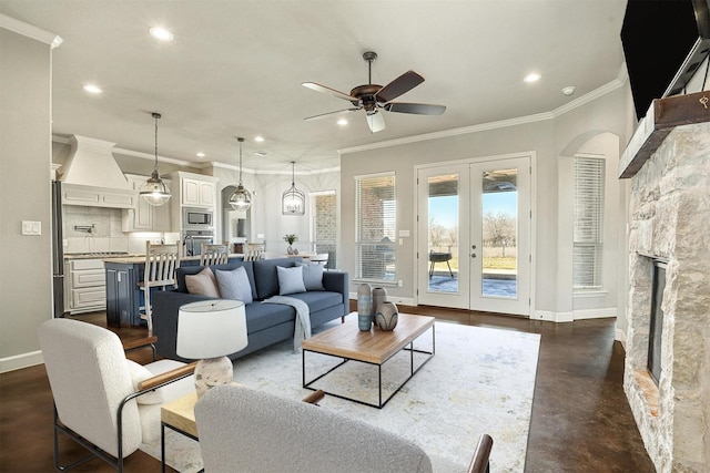 8500 Cobble Stone, Godley, TX 76044 - living room with a ceiling fan, recessed lighting, baseboards, crown molding, and finished concrete floors