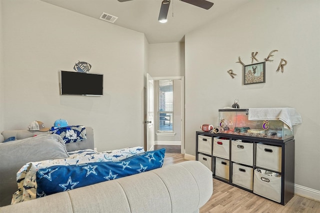 8500 Cobble Stone, Godley, TX 76044 - bedroom featuring baseboards, wood finished floors, and ceiling fan
